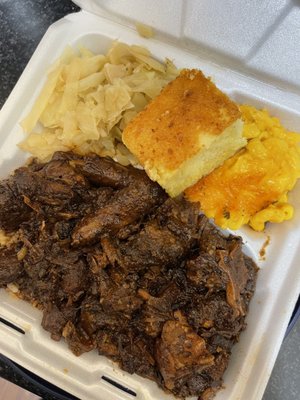 Oxtails with rice and sides